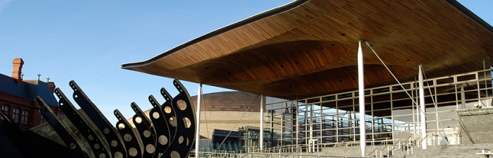 A photo of the front of the Senedd.