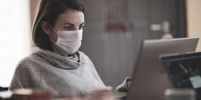 Employee wearing a mask during coronavirus outbreak