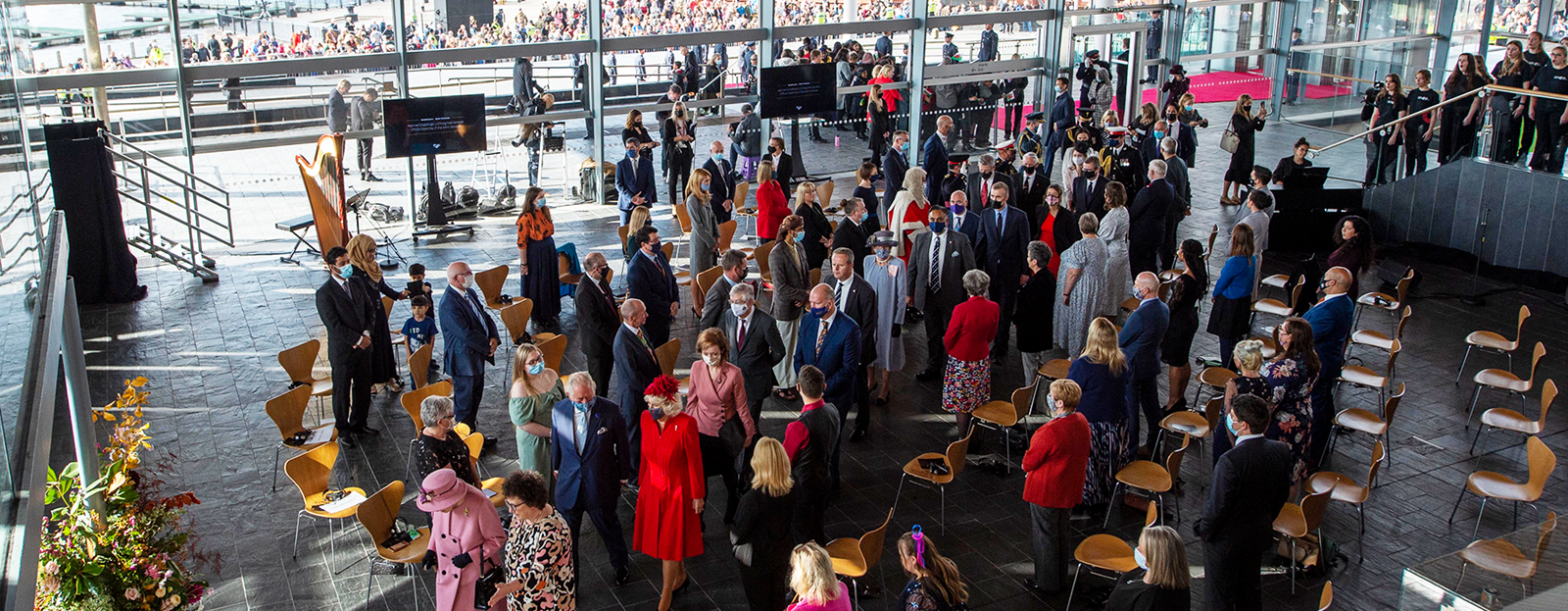 A crowd of people gathered in the Senedd for the Official Opening