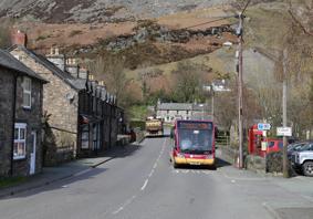 A bus passing through Llangynog in Powys