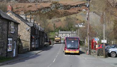 A bus passing through Llangynog in Powys