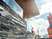 Woman sitting on Senedd steps