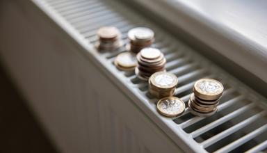 £1 coins on a radiator