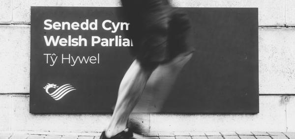 Greyscale legs by Ty Hywel sign
