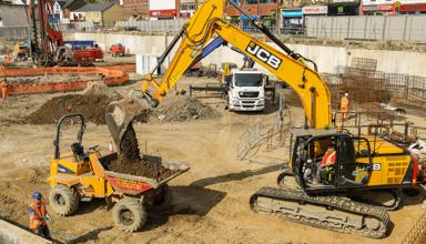 Construction work taking place at a building site.