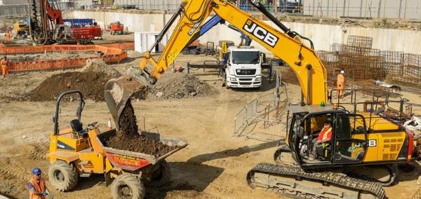 Construction work taking place at a building site.