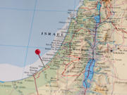 The article’s main image shows a coloured map of Israel and Gaza.