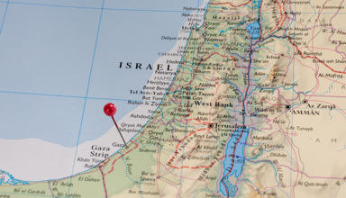 The article’s main image shows a coloured map of Israel and Gaza.