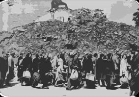 A grayscale image showing a large pile of rubble and debris in the background. In the foreground, a group of people are walking, carrying various bags and belongings.