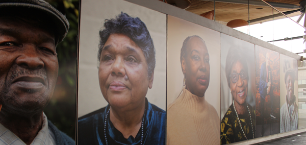 Portraits of people from the Windrush exhibition in the Senedd
