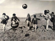 Children bonding at Tonfanau Camp with the international language of football.