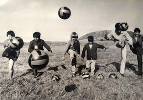 Children bonding at Tonfanau Camp with the international language of football.