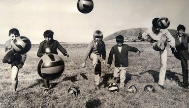 Children bonding at Tonfanau Camp with the international language of football.