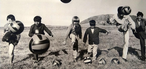 Children bonding at Tonfanau Camp with the international language of football.
