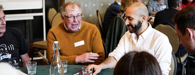 Happy Stakeholders around a table