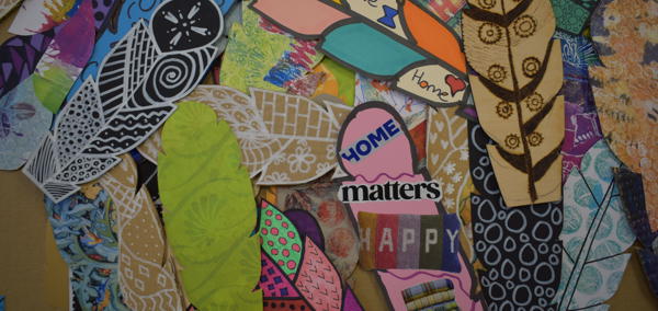 A collection of member’s feathers designed with decorative symbols and meaningful messages and images of hope. 