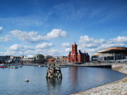 Image of Cardiff Bay, showing the Senedd building and the Pierhead. 