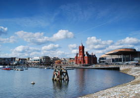 Image of Cardiff Bay, showing the Senedd building and the Pierhead. 