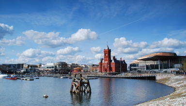 Image of Cardiff Bay, showing the Senedd building and the Pierhead. 