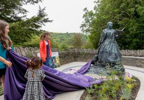 The statue of Cranogwen, created by Sculptor Sebastien Boyesen, was unveiled in Llangrannog by village children on 10 June 2024.