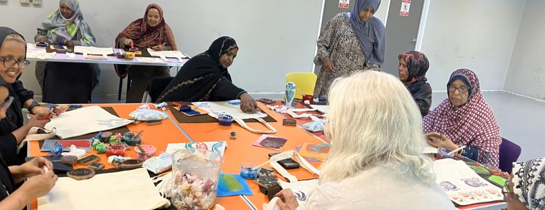 People taking part in a craft workshop