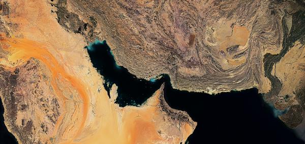 The article's main image is a colour satellite image of the Strait of Hormuz